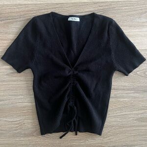 Black ribbed crop top with ruched front